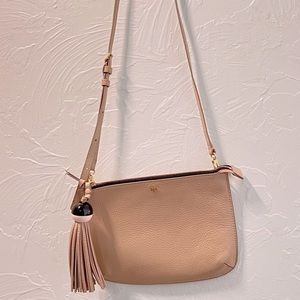 Tory Burch Slim Tan cross body with Tassel